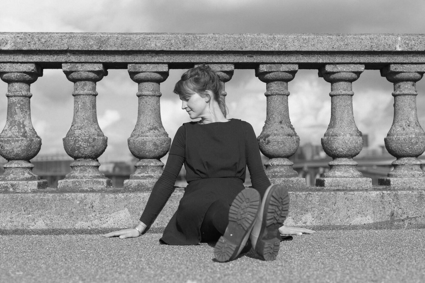 anika-sitting-burnside-bridge-portland-bw