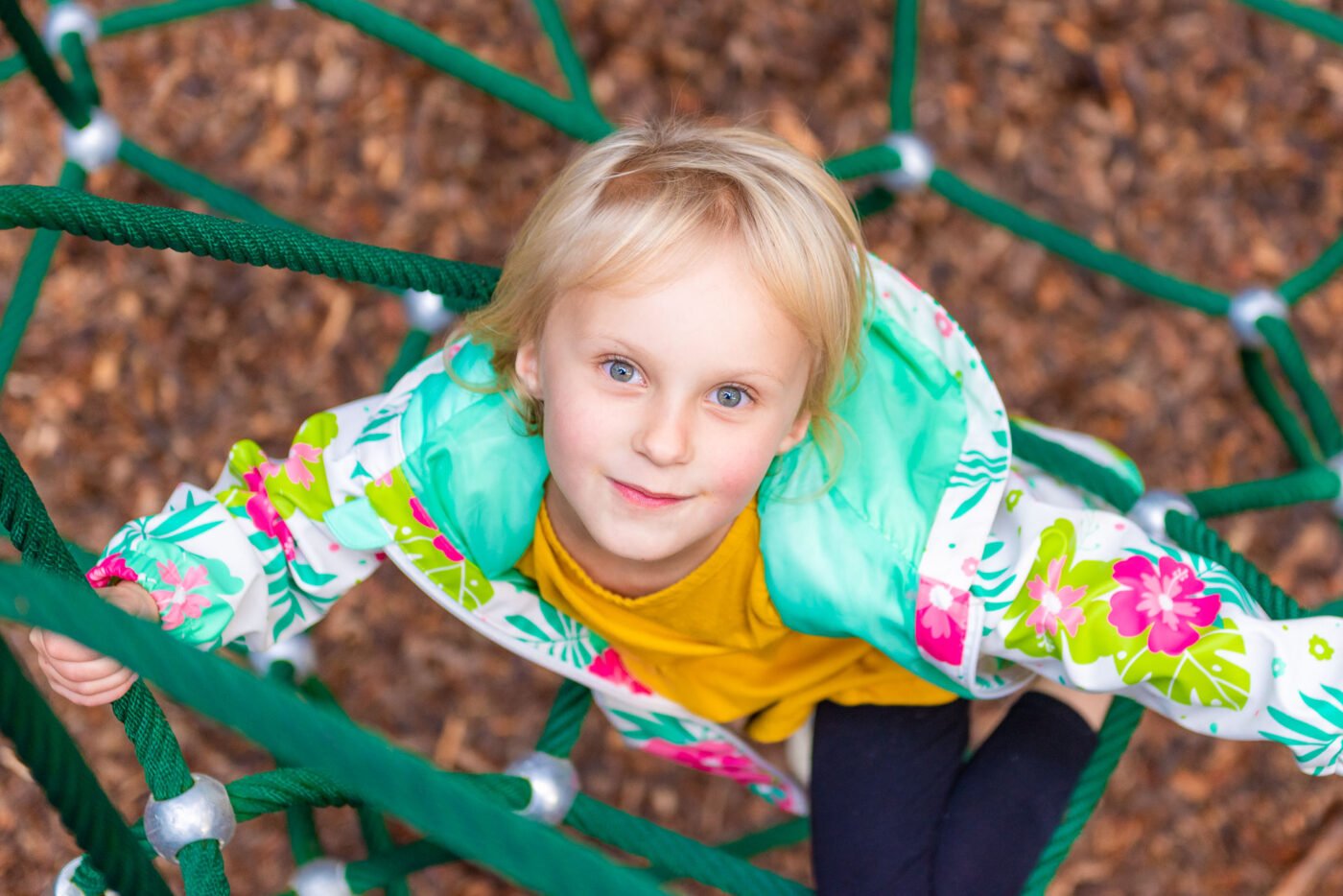 girl-climbing-play-structure