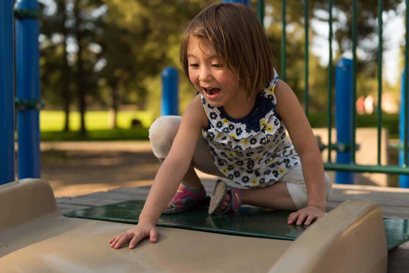 nina-excited-playground-slide