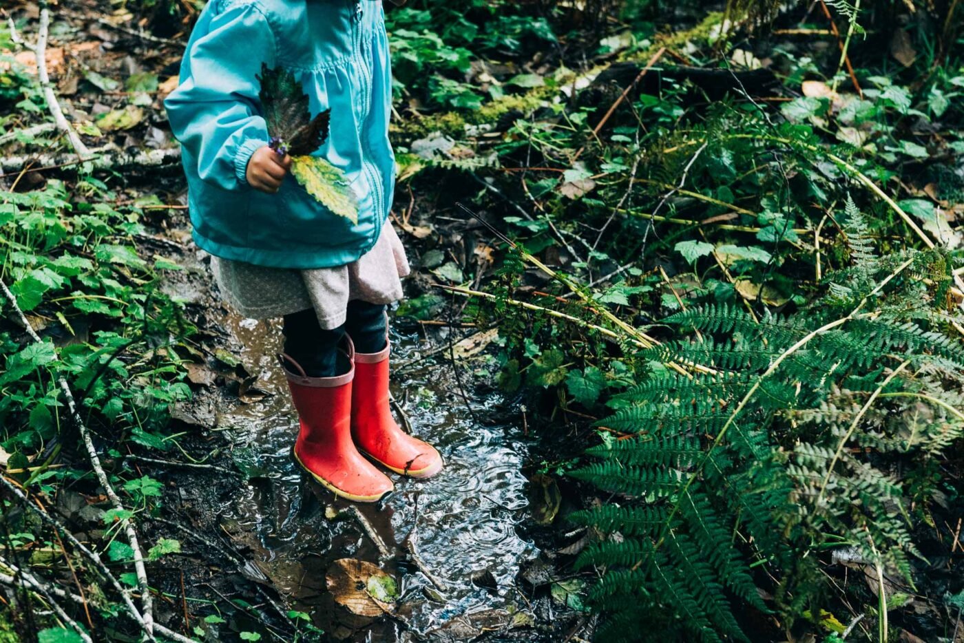 pink-rain-boots-in-puddle