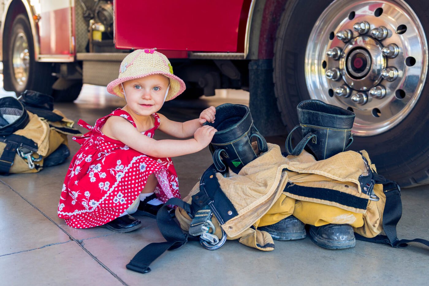 girl-checking-fire-fighter-boots girl-checking-fire-fighter-boots